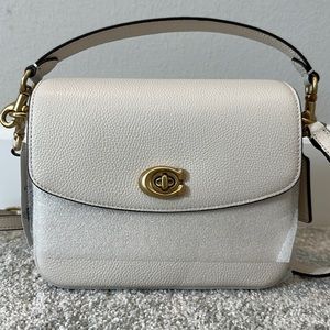 Coach Cassie crossbody in Chalk.